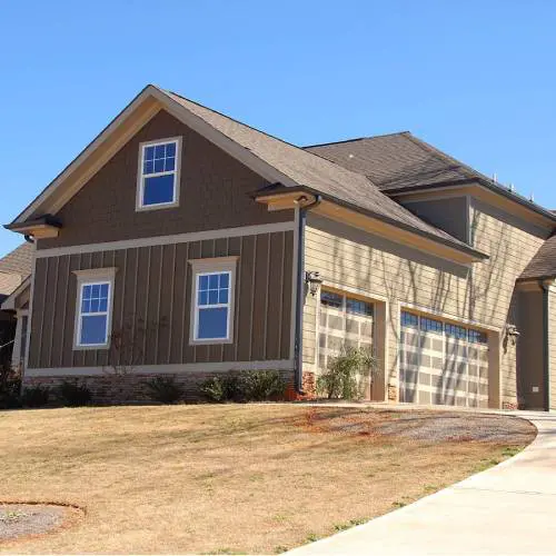 Modern suburban house with three garages.